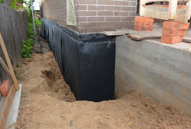 SJ Waterproofing Pros technician performing targeted Sump Pump Installation assessment in Lakeview, GA